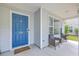 Cozy front porch with comfortable seating, stylish decor, and ample natural light at 110 Moon Shadow Ln, Summerville, SC 29485