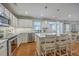 Modern kitchen featuring stainless steel appliances, white cabinets and marble countertops at 110 Moon Shadow Ln, Summerville, SC 29485