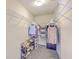 Walk-in closet with white wire shelving racks at 110 Moon Shadow Ln, Summerville, SC 29485