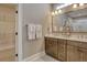 Bathroom with double sinks, a large mirror, and modern fixtures, providing both style and functionality at 114 Headwater Dr, Summerville, SC 29486