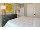 Comfortable bedroom with closet, large dresser, artwork and natural light for a relaxing and inviting atmosphere at 114 Headwater Dr, Summerville, SC 29486