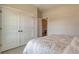 This bedroom features neutral walls, a closet with double doors and a doorway leading to another room at 114 Headwater Dr, Summerville, SC 29486