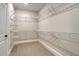 Walk-in closet with ample shelving and storage space, maximizing organization and convenience at 114 Headwater Dr, Summerville, SC 29486