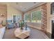 Inviting living room with fireplace, French doors, large windows and comfortable seating perfect for Gathering and guests at 114 Headwater Dr, Summerville, SC 29486