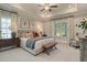 Serene bedroom with tray ceiling, comfortable seating, lots of natural light and stylish decor, creating a peaceful retreat at 114 Headwater Dr, Summerville, SC 29486