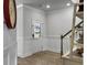 Bright entryway featuring wainscoting, and a decorative front door at 115 Daniels Creek Cir, Goose Creek, SC 29445