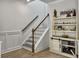 Elegant staircase with white railing and stylish decor for a touch of sophistication at 115 Daniels Creek Cir, Goose Creek, SC 29445
