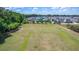 Overhead view of a community sports field with soccer goals, surrounded by tree-lined streets and homes at 120 Loon Dr, Summerville, SC 29483