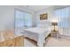 Cozy bedroom with a comfortable bed, soft lighting, and bright natural light at 120 Loon Dr, Summerville, SC 29483
