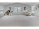 Spacious bonus room with large windows and comfortable seating area at 120 Loon Dr, Summerville, SC 29483