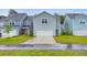 Charming exterior of a two-story home with an attached garage and well-manicured lawn at 120 Loon Dr, Summerville, SC 29483