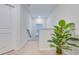 Bright upstairs hallway with neutral carpet and a leafy plant at 120 Loon Dr, Summerville, SC 29483