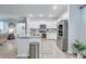Well-lit kitchen with stainless steel appliances, granite countertops, and ample cabinet space at 120 Loon Dr, Summerville, SC 29483