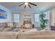Comfortable living room showcasing a sectional sofa, light-filled windows, and homey decor at 120 Loon Dr, Summerville, SC 29483
