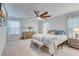 Spacious main bedroom with a ceiling fan and a king-sized bed at 120 Loon Dr, Summerville, SC 29483