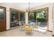 Cozy breakfast nook featuring bright windows and sliding doors leading to the backyard and patio at 1218 Chersonese Round, Mount Pleasant, SC 29464