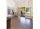 Inviting foyer with tiled floor, showcasing the home's entrance and a glimpse into the living spaces at 1218 Chersonese Round, Mount Pleasant, SC 29464