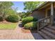 Inviting front entrance with brick walkway, mature landscaping, and charming home facade at 1218 Chersonese Round, Mount Pleasant, SC 29464