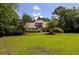 Well-maintained single-Gathering home with a neatly manicured green lawn and mature landscaping at 1218 Chersonese Round, Mount Pleasant, SC 29464