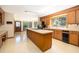 Retro kitchen with central island, stainless steel appliances, and plenty of countertop space at 1218 Chersonese Round, Mount Pleasant, SC 29464
