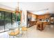 Bright kitchen with stainless appliances and a cozy breakfast nook offering a pool view at 1218 Chersonese Round, Mount Pleasant, SC 29464