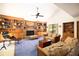 Cozy living room featuring built-in shelving, a fireplace, comfortable seating and carpeted floor at 1218 Chersonese Round, Mount Pleasant, SC 29464