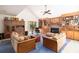 Spacious living room featuring vaulted ceiling, built-in shelving, and fireplace and comfortable seating at 1218 Chersonese Round, Mount Pleasant, SC 29464