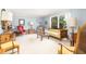 Bright living room featuring a large window and comfortable seating, perfect for relaxation at 1218 Chersonese Round, Mount Pleasant, SC 29464