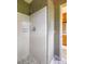 Shower featuring white tile and a glass shower door at 1218 Chersonese Round, Mount Pleasant, SC 29464