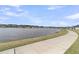 Peaceful view of community lake and sidewalk path at 1273 Locals St, Summerville, SC 29485