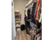 Walk-in closet with wire shelving, rods, and packed with clothes, shoes and accessories at 1273 Locals St, Summerville, SC 29485