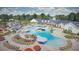 Expansive resort-style pool with ample lounge seating, umbrellas, and lush landscaping at 1273 Locals St, Summerville, SC 29485