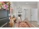Welcoming foyer with wood floors, a colorful rug, and views into the main living area at 1273 Locals St, Summerville, SC 29485