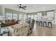 Bright and open living room featuring an open floor plan, modern lighting and views of the water at 1273 Locals St, Summerville, SC 29485