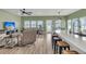 Bright living room with an open floor plan, features a breakfast bar, and scenic views of the water at 1273 Locals St, Summerville, SC 29485