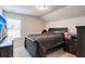 This bedroom has carpet floors, a neutral color, and a flat-screen television at 130 Stagecoach Ave, Summerville, SC 29486
