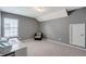 Bedroom features gray walls, a chair, a desk, a window, and carpeted floors at 130 Stagecoach Ave, Summerville, SC 29486