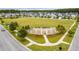 Expansive community space with pergola, hardscape and lawn, ideal for neighborhood gatherings and outdoor enjoyment at 130 Stagecoach Ave, Summerville, SC 29486