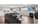 Open-concept living room and dining room with ample natural light and stylish decor at 130 Stagecoach Ave, Summerville, SC 29486