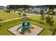 Community playground with a slide and climbing area, perfect for outdoor fun in a Gathering-friendly neighborhood at 130 Stagecoach Ave, Summerville, SC 29486