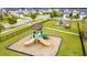 Neighborhood playground featuring slides, a bench, and a play area for residents to enjoy outdoor activities at 130 Stagecoach Ave, Summerville, SC 29486