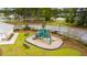 Community playground with a playset and benches at 130 Stagecoach Ave, Summerville, SC 29486