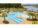 Community pool featuring palm trees, pergolas, and zero entry access at 130 Stagecoach Ave, Summerville, SC 29486