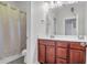 Bathroom featuring a double sink vanity, and a shower with a curtain at 1348 Seaside Plantation Dr, Charleston, SC 29412