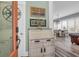 Bright foyer with decorative furniture, open to dining area, creating a welcoming and airy atmosphere at 1348 Seaside Plantation Dr, Charleston, SC 29412
