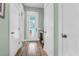 Hallway with white doors and views of the exterior at 1348 Seaside Plantation Dr, Charleston, SC 29412
