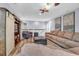 Cozy living room with a large sofa, chair, and barn-door style media center at 1348 Seaside Plantation Dr, Charleston, SC 29412