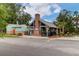 Community pool house with brick chimney, offering a shaded picnic area and nearby parking at 1348 Seaside Plantation Dr, Charleston, SC 29412