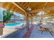 Poolside view from the community pavilion, showcasing lounge chairs and inviting recreation area at 1348 Seaside Plantation Dr, Charleston, SC 29412