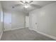 Spacious bedroom with neutral paint, carpeted floor, and multiple closets at 141 Larson Dr, Summerville, SC 29485